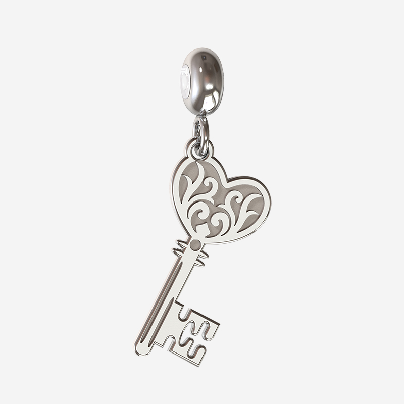 Silver heart key charm in sterling silver
