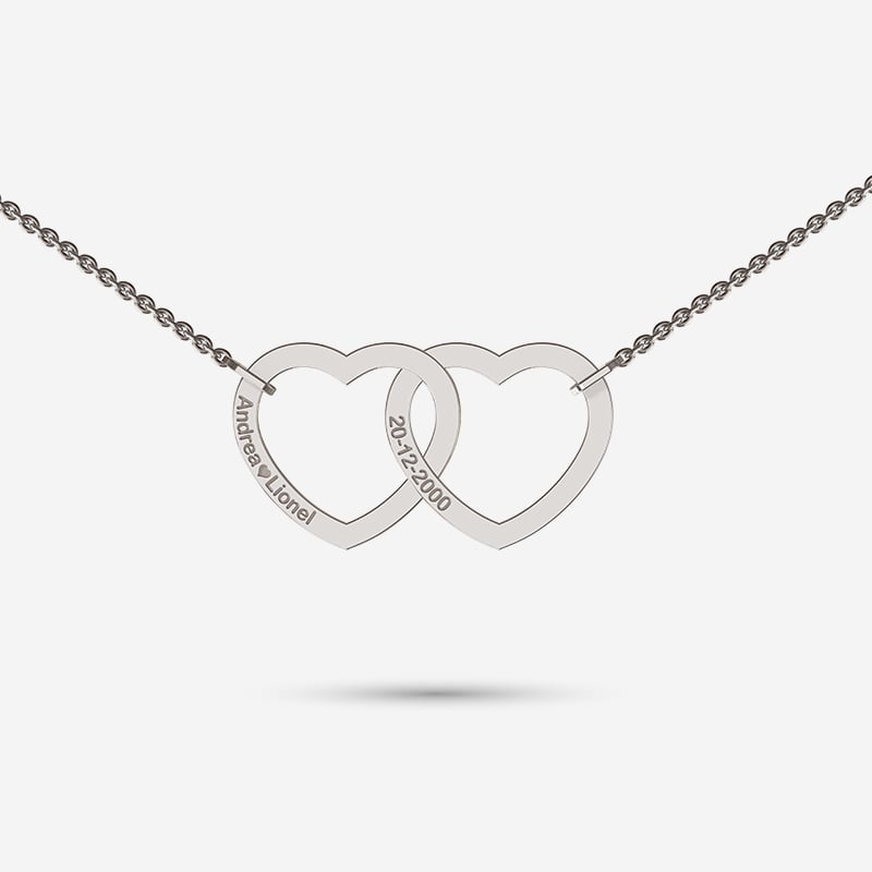 Two hearts beat as one in sterling silver necklace