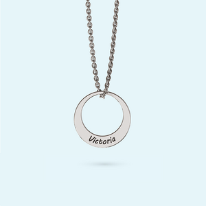 Silver designer circle with name engraved as a necklace