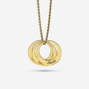 Multiple circles with names engraved on a necklace