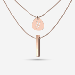 Layered drop bar and pebble pendant necklace in rose gold