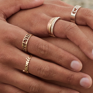 Stackable Name rings in mixed gold by Memi Jewellery