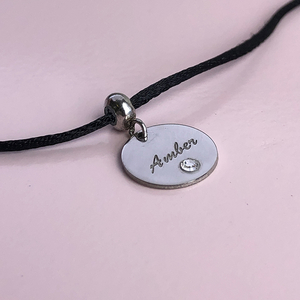 Personalised Disc Charm with Birthstone and engaved name on cord bracelet by Memi Jewellery
