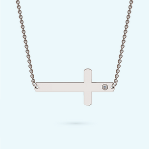 Sterling silver sideways cross necklace with a genuine diamond